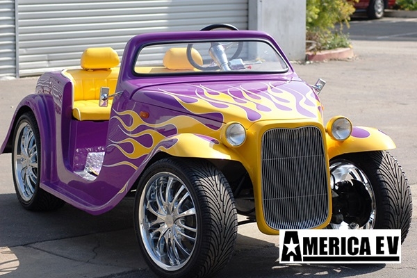 Purple California Roadster with Yellow Flames affordable golf cart rental, golf cart rent georgia