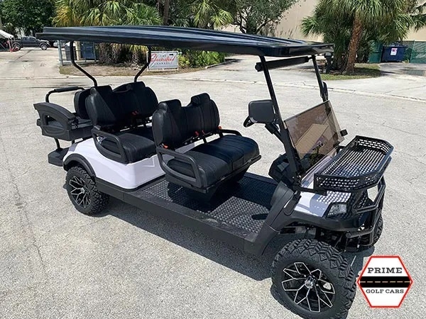 White Aluma 6 Passenger Lifted Golf Cart affordable golf cart rental, golf cart rent georgia