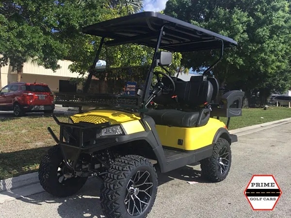 Yellow Aluma 4 Passenger Lifted Golf Cart affordable golf cart rental, golf cart rent georgia